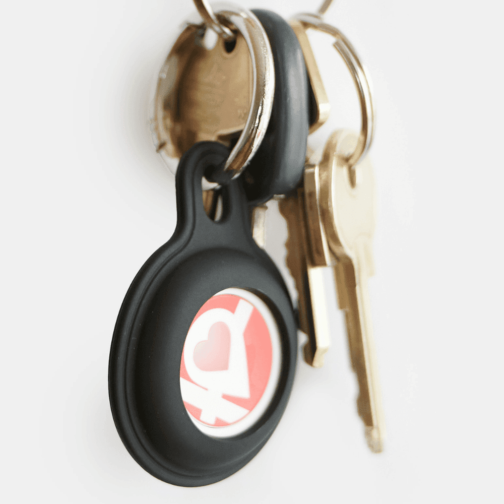 The Bluetooth safety button in its holder on a keyring alongside ordinary keys